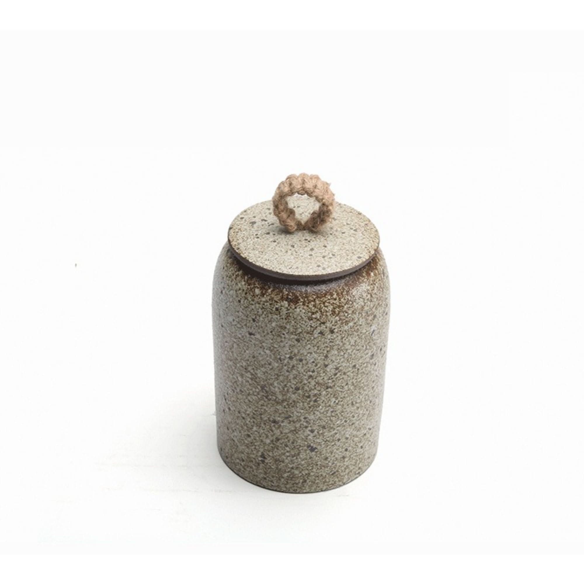 Speckled ceramic tea canister with natural cord lid. Storage jar for tea, coffee, sugar.