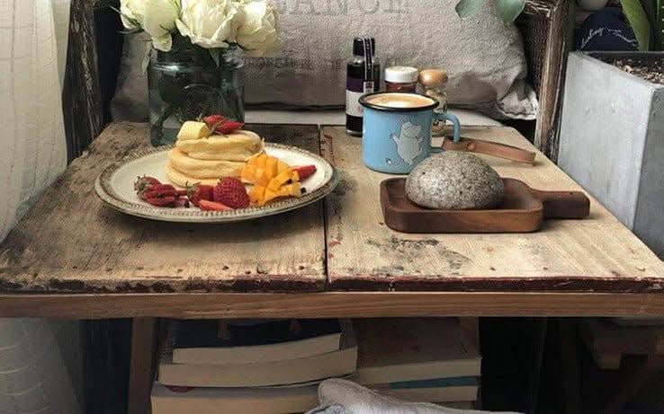 Japanese Tableware Handmade Set: pancakes, fruit, coffee & bread on rustic wood table.