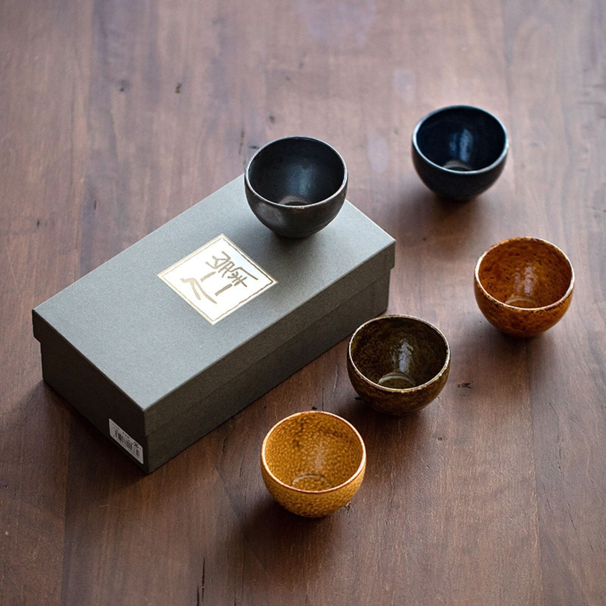 Japanese-Imported Glazed Tea Cup 5 Set 5oz | Ceramic tea ceremony set with rustic charm on wooden surface.