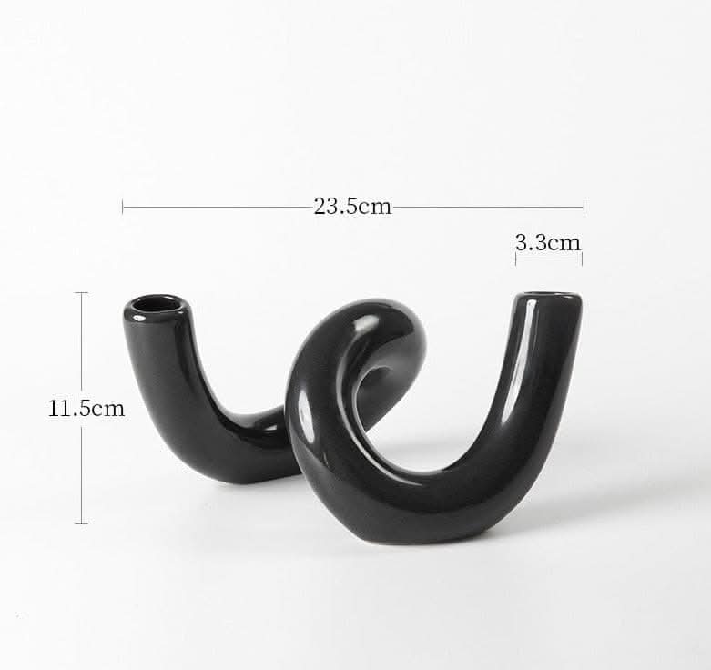 Black ceramic irregular spiral flower vase. Japanese imported home decor.