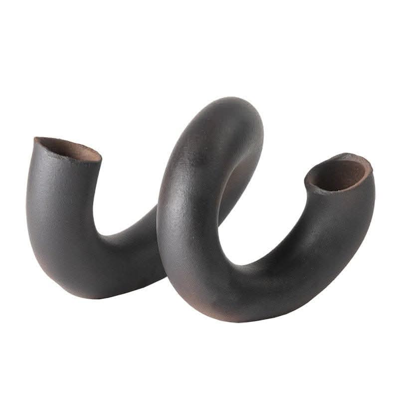 Dark gray, irregular spiral ceramic flower vase. Japanese home decor, uniquely shaped.