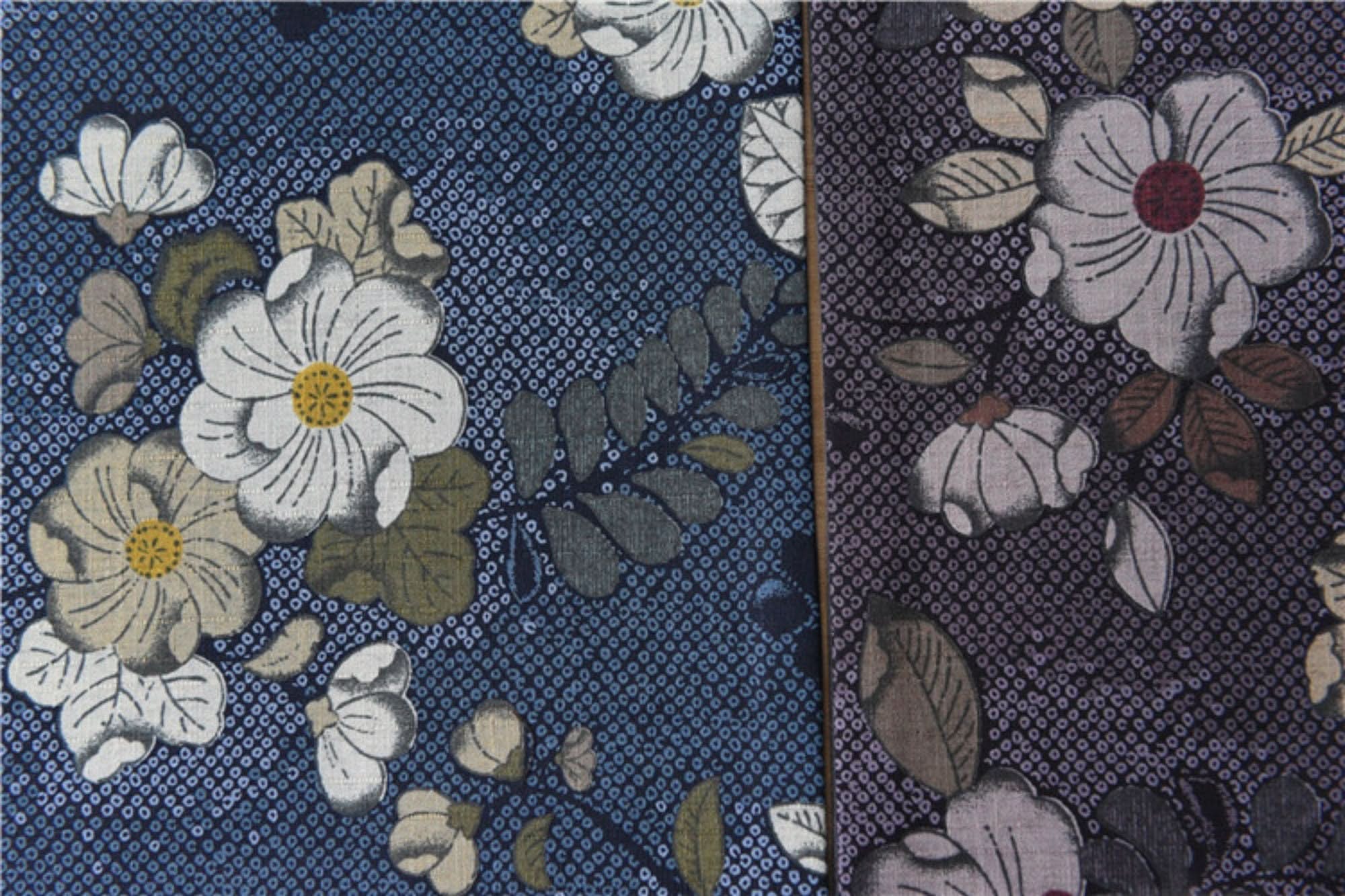 Japanese linen tea towels with floral patterns in blue and purple hues, featuring cherry blossoms.