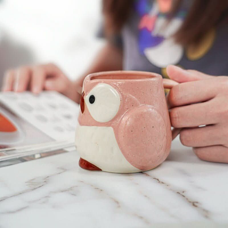 Pink stoneware owl mug with cream accents, Japanese Mino pottery home decor.