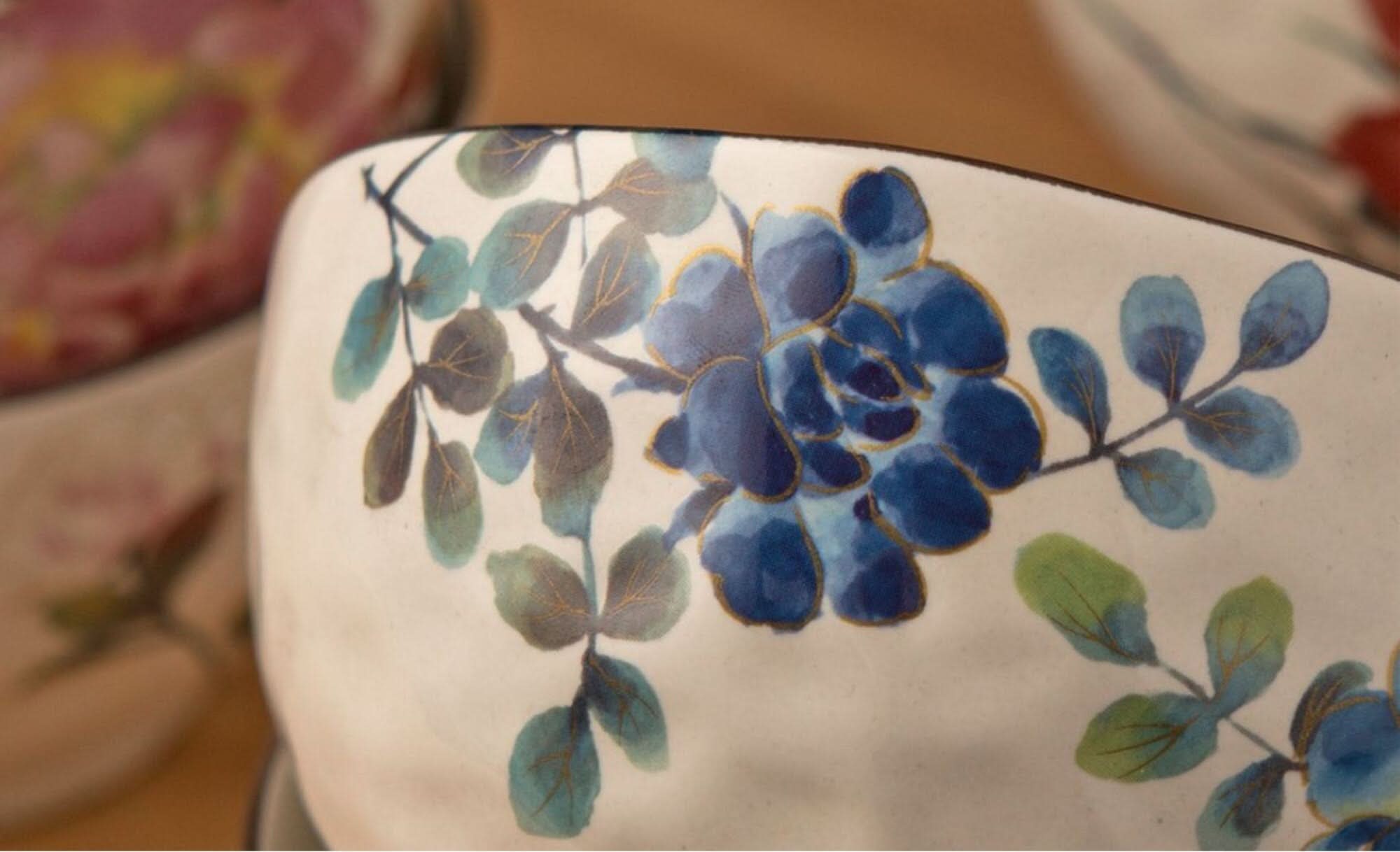 White rice bowl set with blue floral design made in Japan.