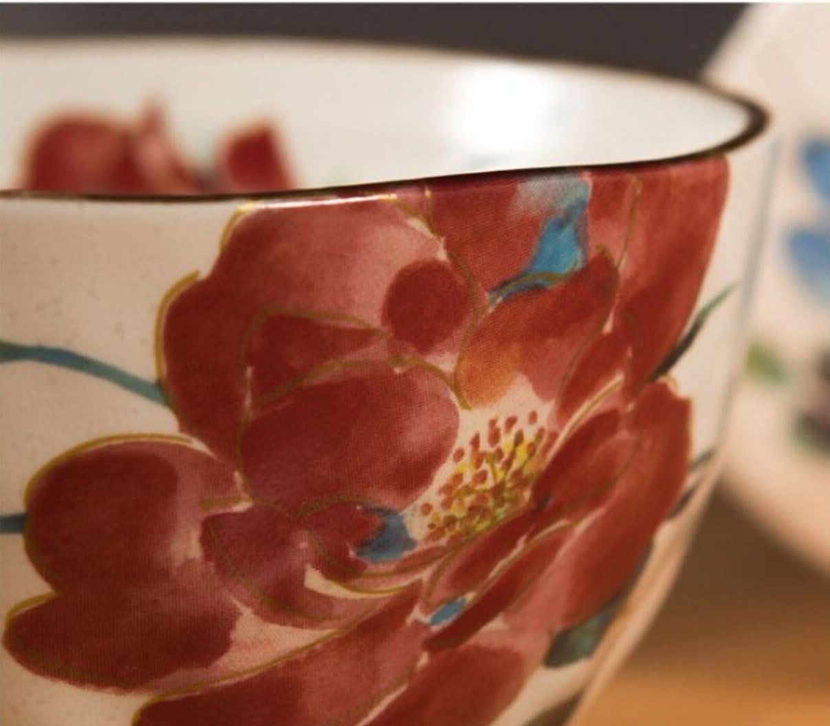 Red floral pattern on white ceramic Rice Bowl Set Made In Japan, with gold trim.