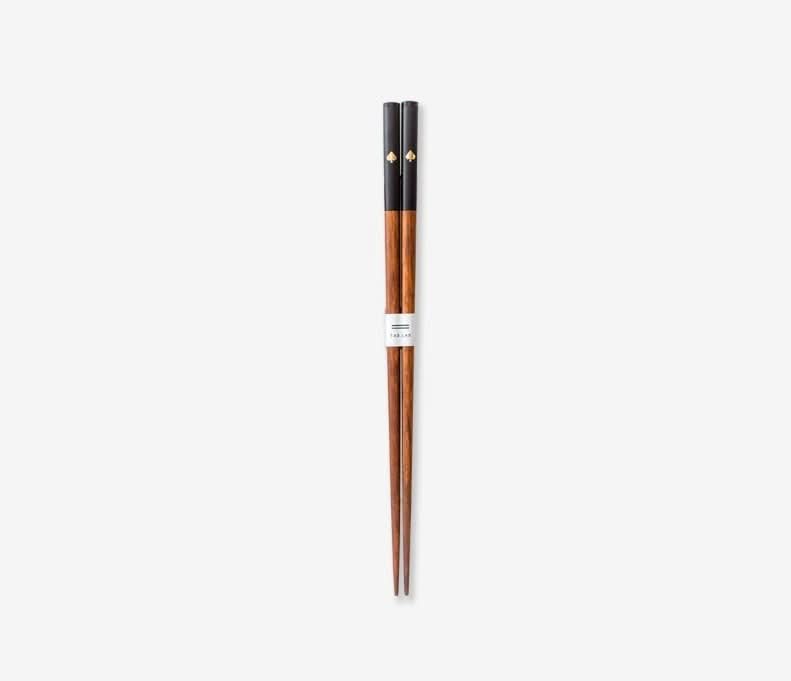 Japanese Solid Wood Peach Heart Chopsticks with black spade design, perfect for couples.