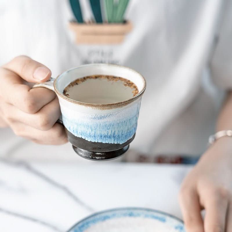 Japanese Stoneware 3 Tone Glazed Mug With Coasters, blue ombre ceramic mug held, with coaster detail