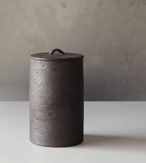 Japanese style raw rustic tea jar, dark textured ceramic storage for tea, coffee, sugar, spices.
