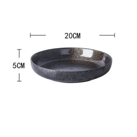 Japanese-style deep ceramic salad dish, creative tableware, dark speckled finish.