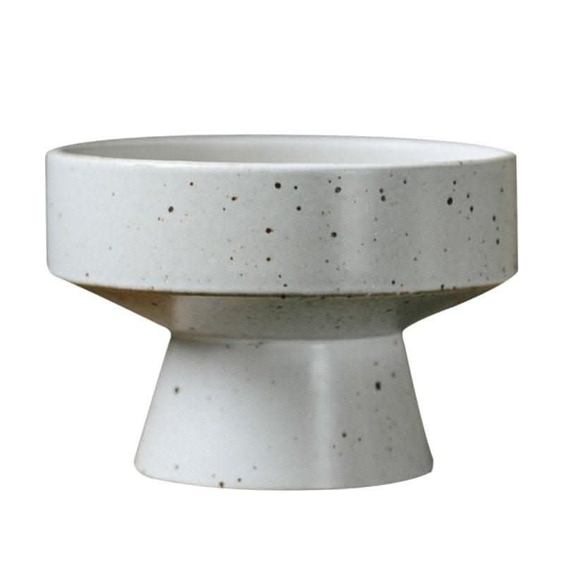 White speckled stoneware fruit plate in Japanese style on a pedestal.