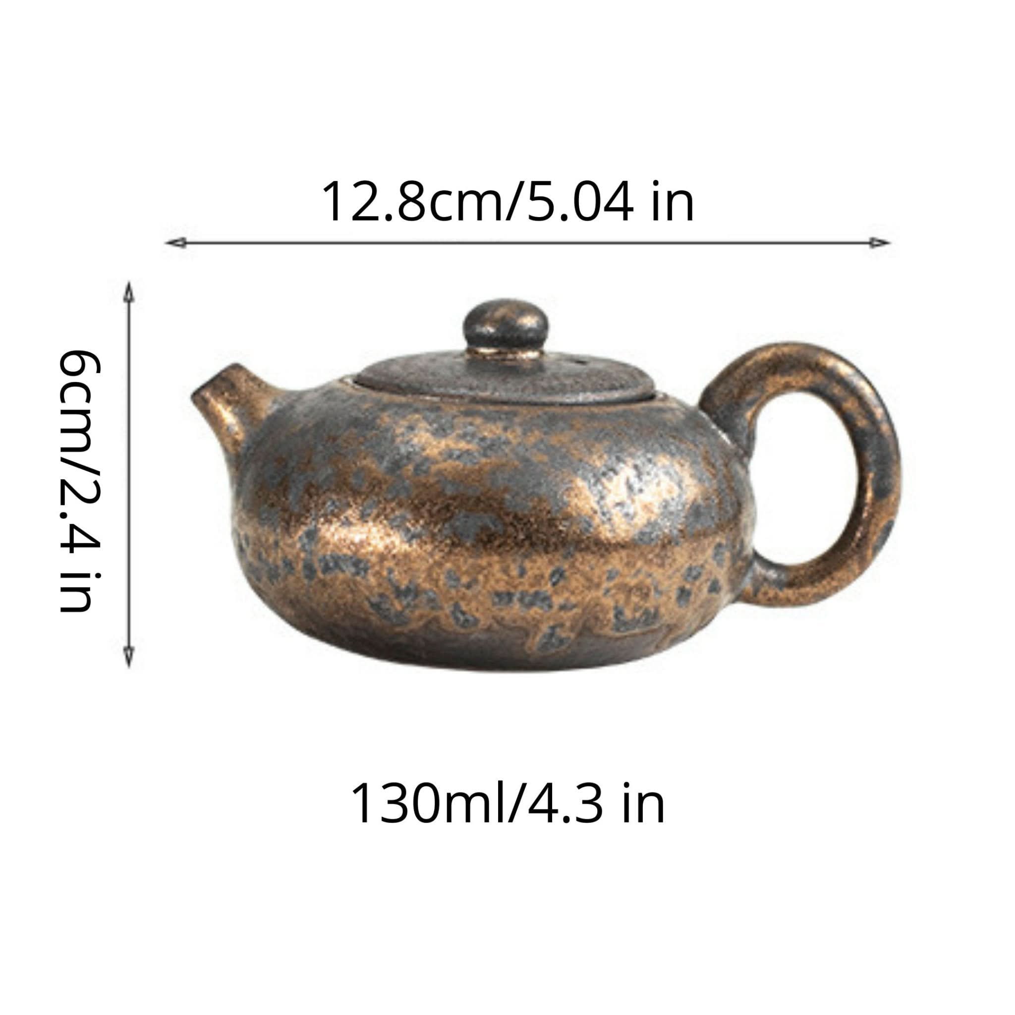 Japanese stoneware gilt glazed teapot with rustic bronze finish.
