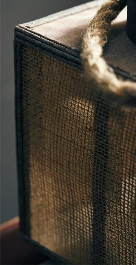 Brown burlap and wood Coastal Candle Holder with rope detail.