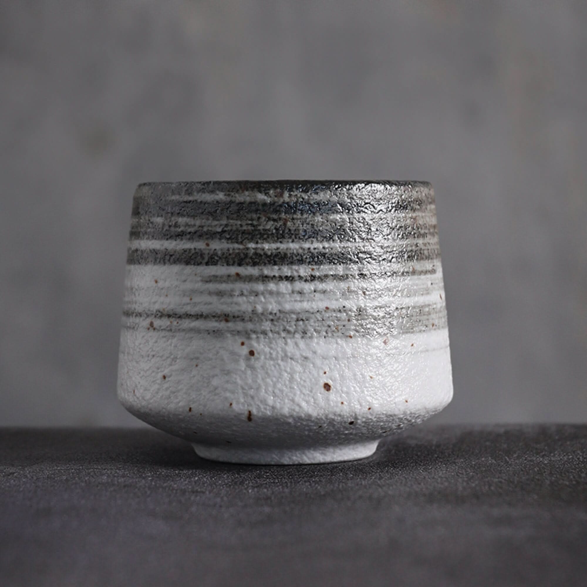 Japanese tea cup with gray tones, textured ceramic home decor