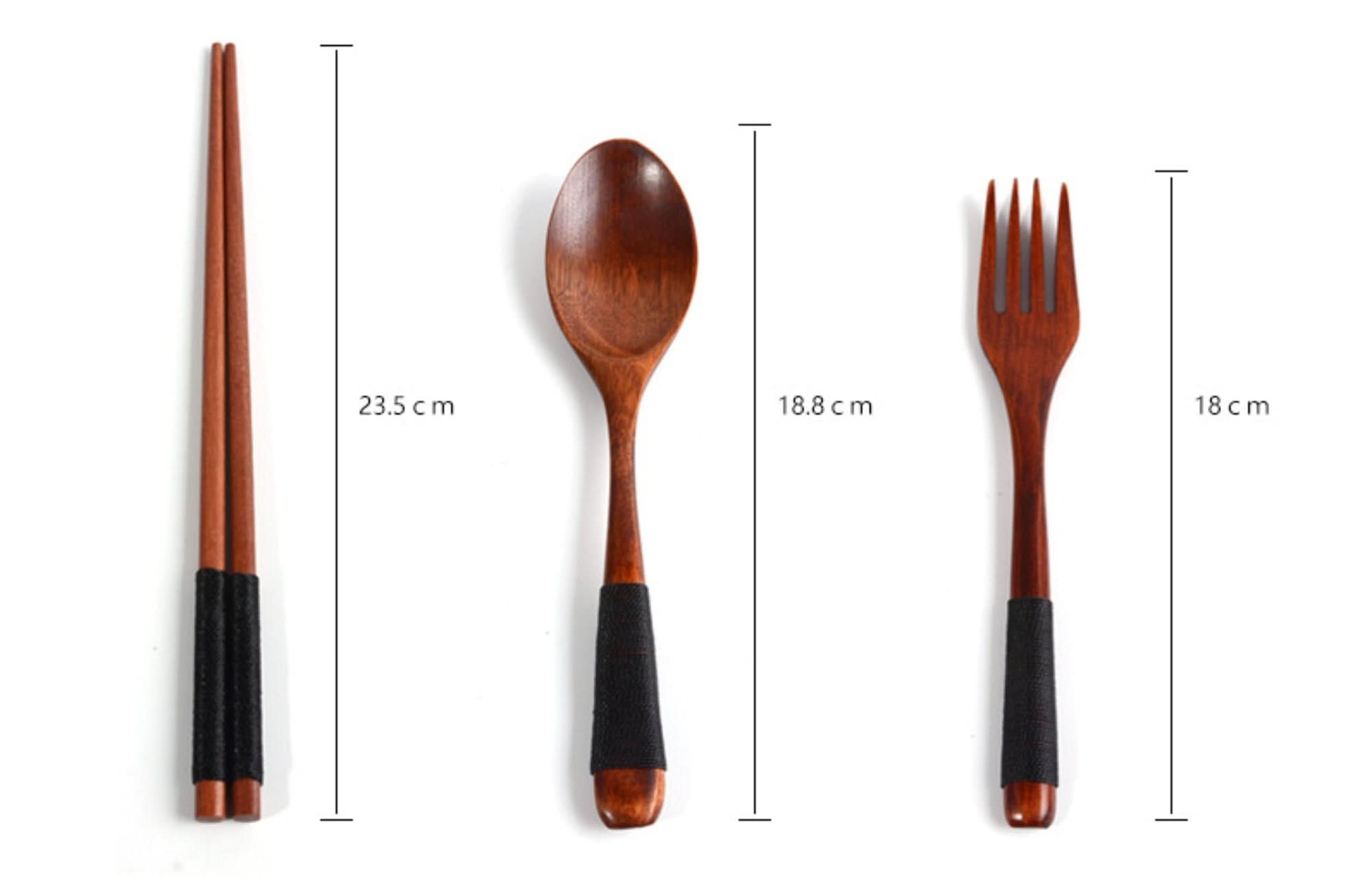 Japanese wood cooking utensils: chopsticks, spoon, fork with black grips. Natural wooden.
