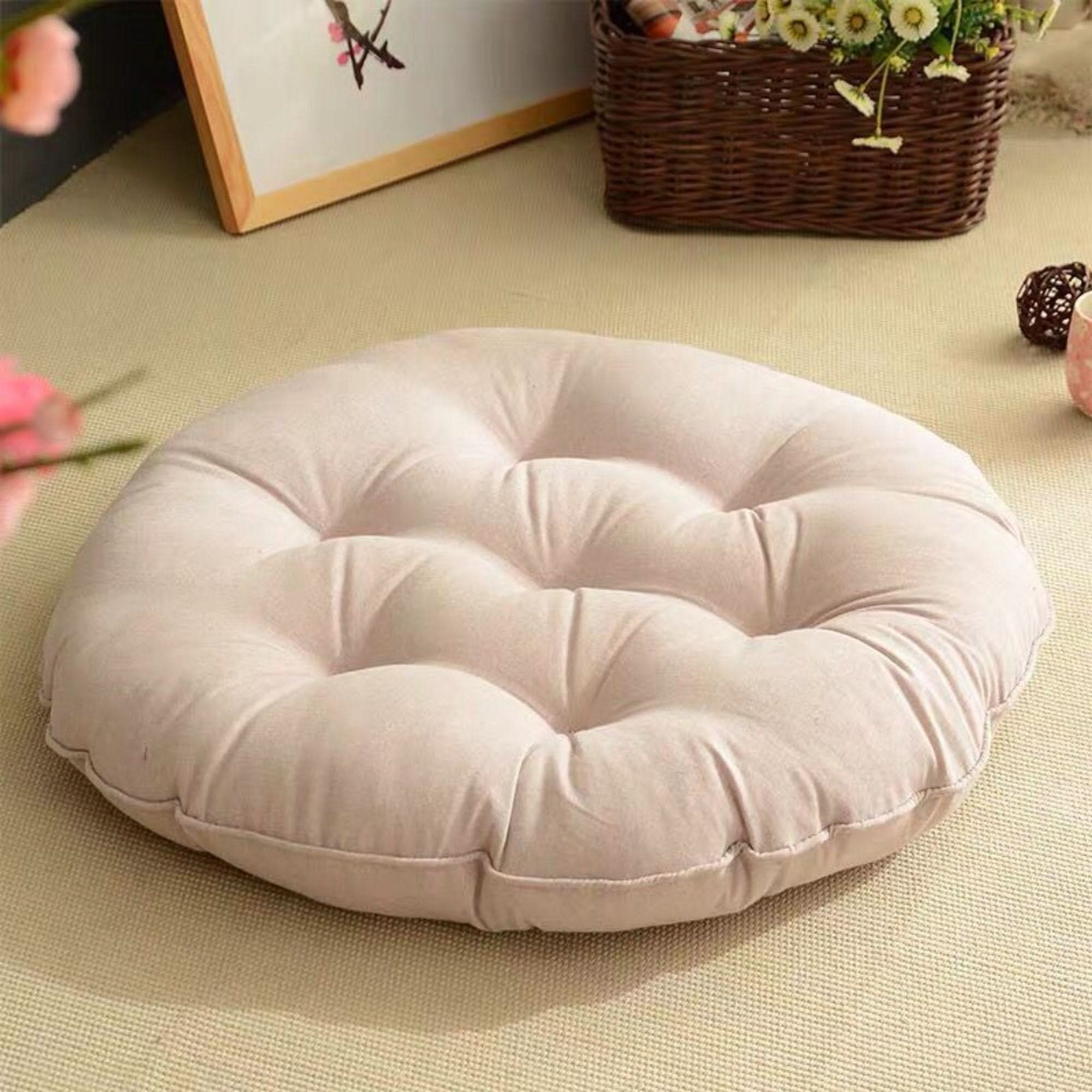 Light pink tufted linen meditation cushion 23" and 18" for home decor.