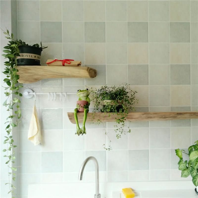 Log live edge wall hanging shelves display plants and decor in a kitchen setting.