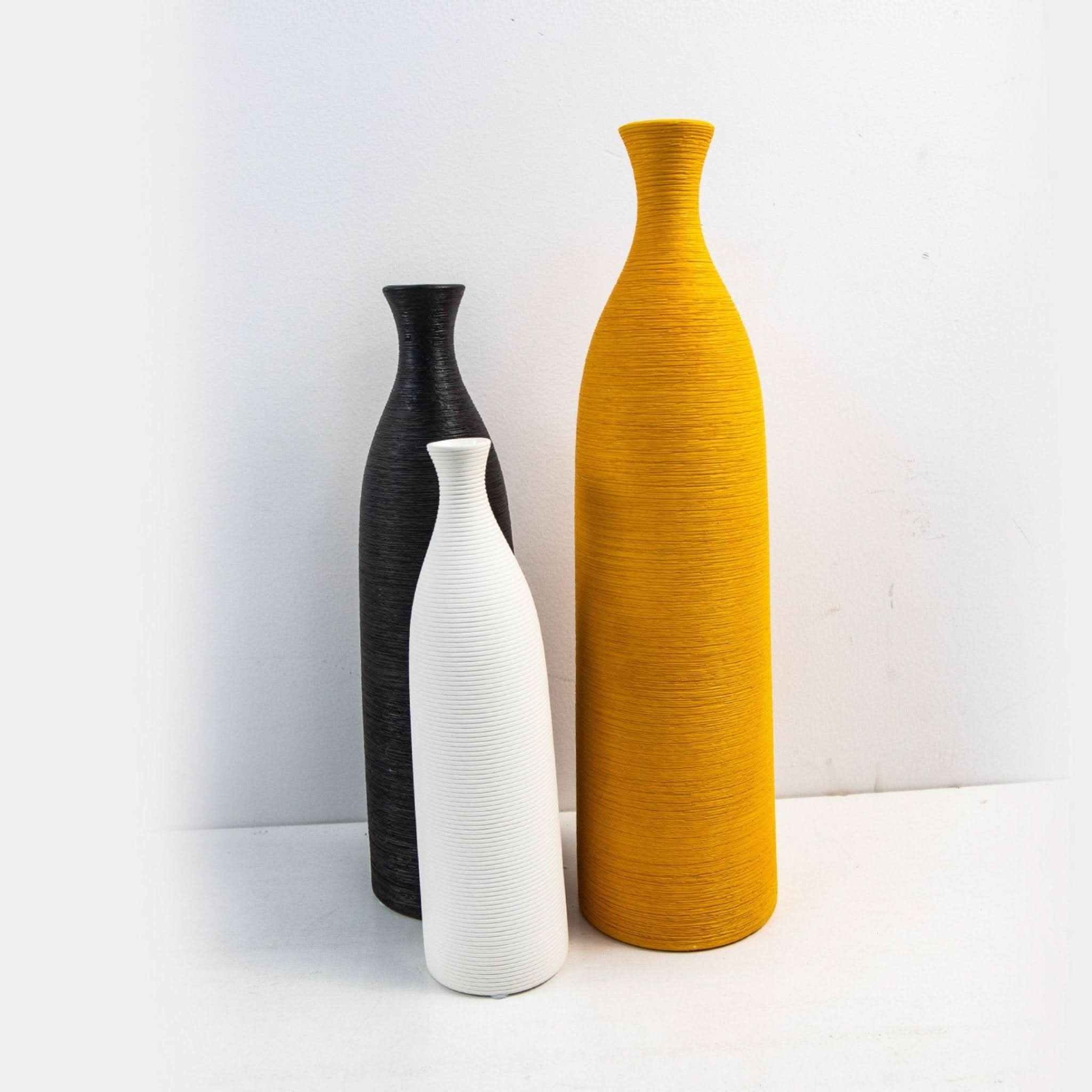 Minimalist Ceramic Vase in black, white, and yellow. Modern zen decor.