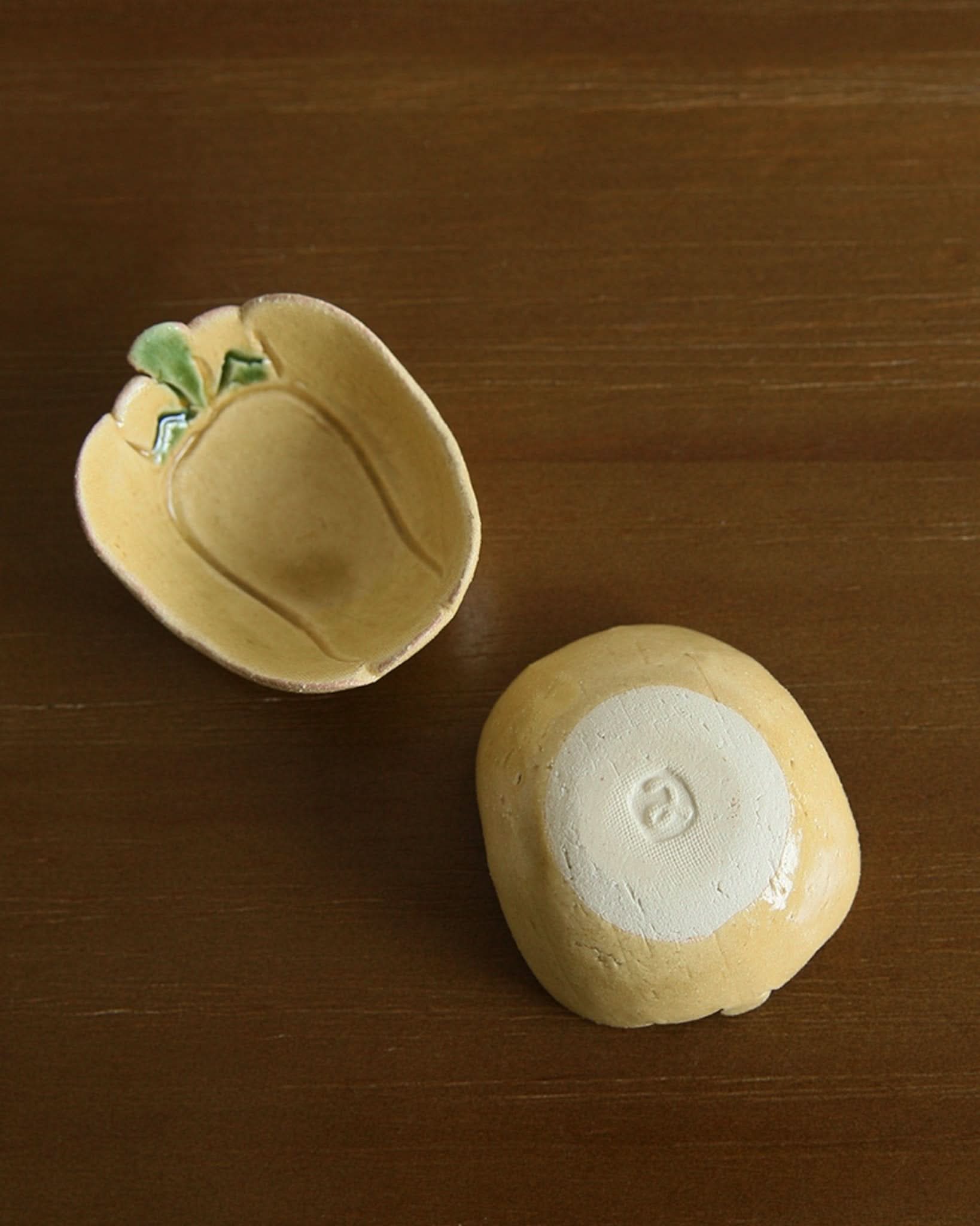 Mino-yaki handmade yellow carrot-shaped stoneware dip bowl, for snacks and appetizers.