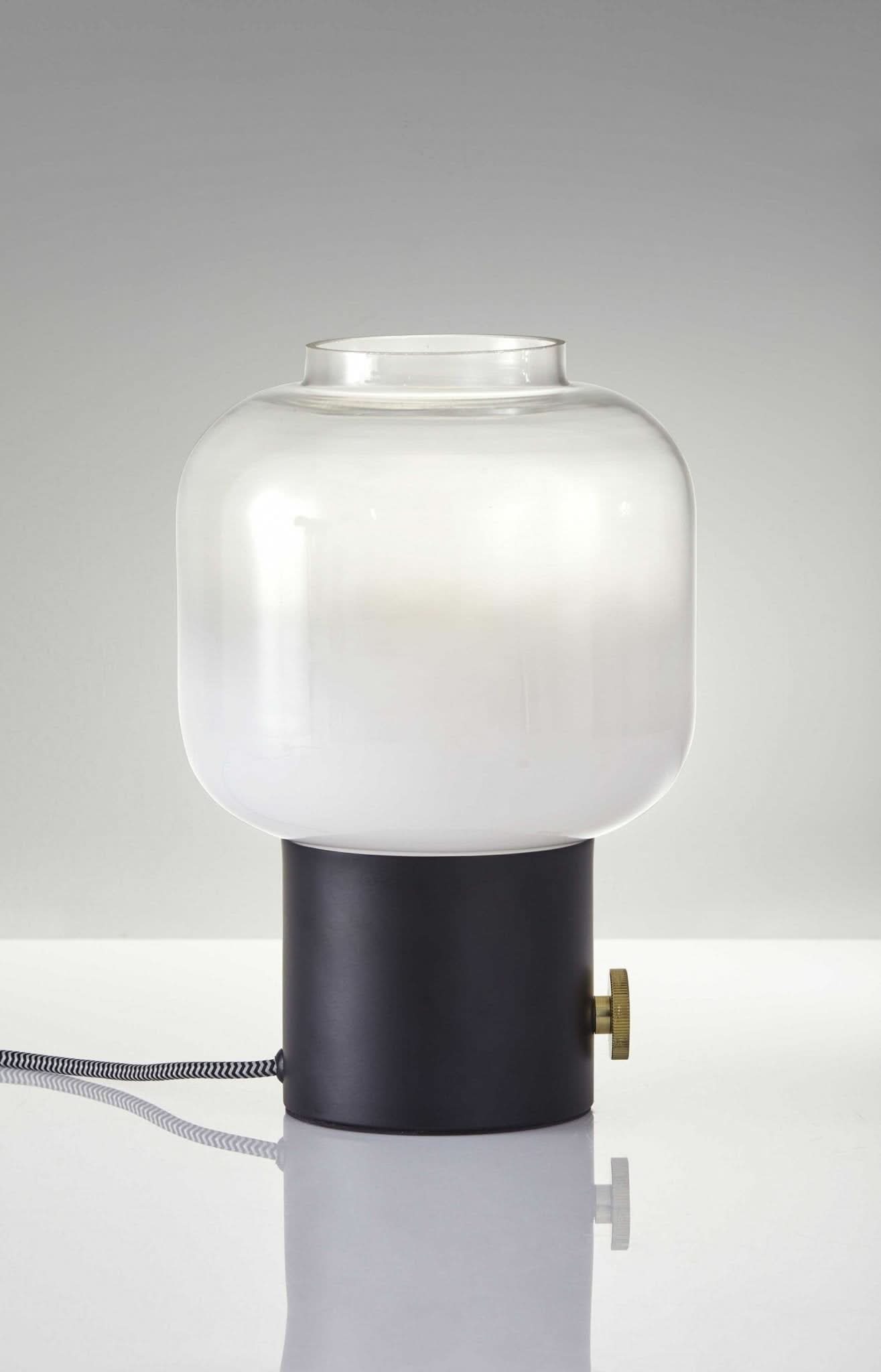 Mod Pod Brass Glass Table Lamp with black cylinder base and frosted glass shade.