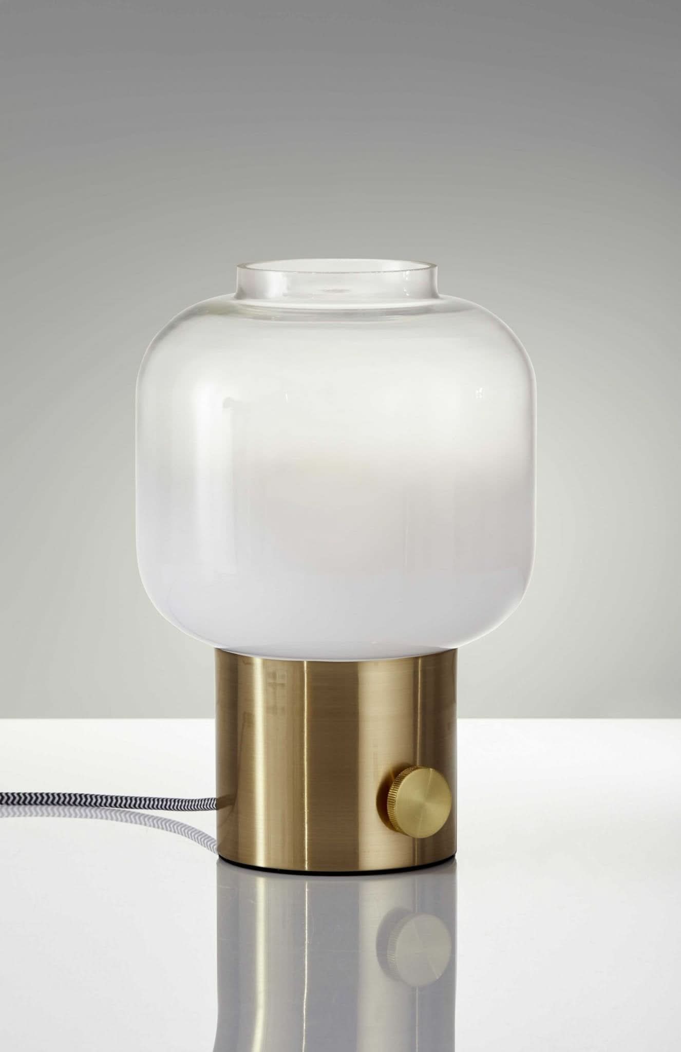 Mod Pod brass glass table lamp with white frosted shade and a gold dimmer switch.