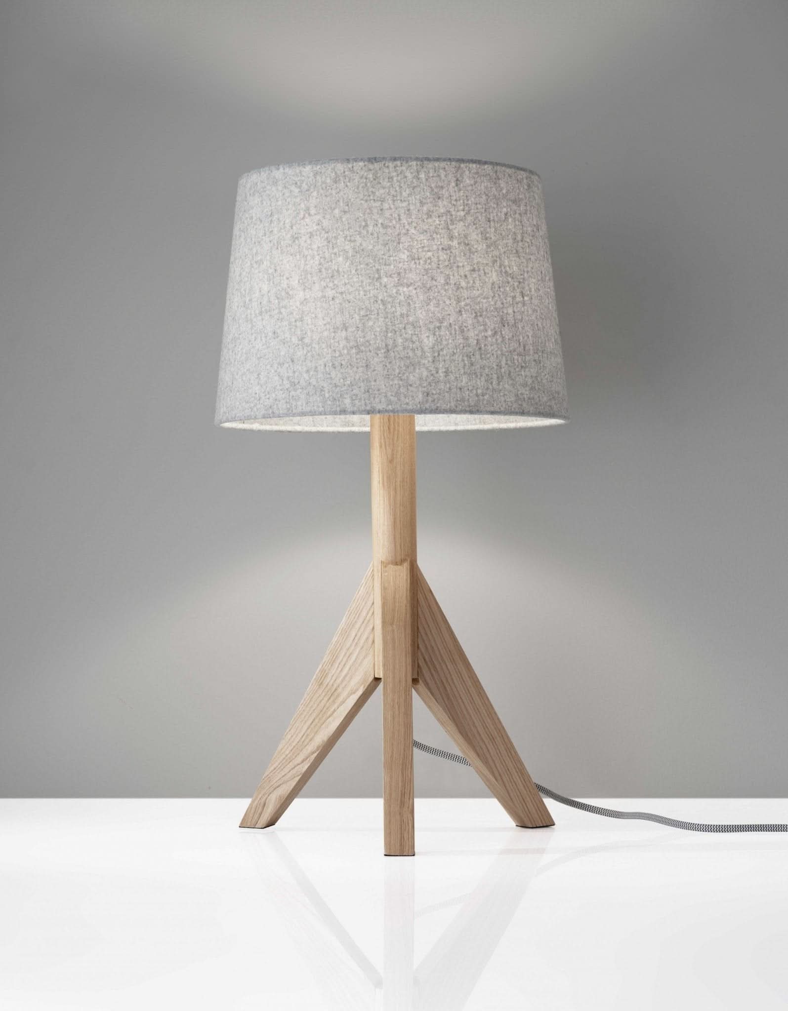 Natural Wood Tripod Base Table Lamp with grey paper shade, modern, mid-century style.