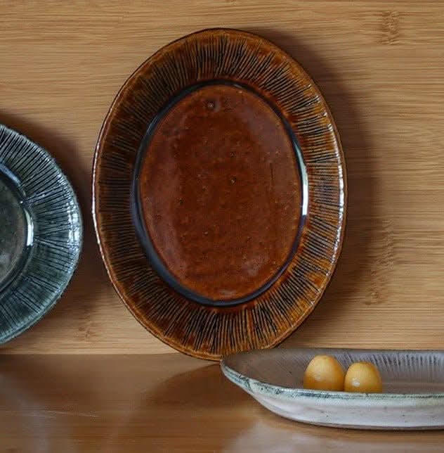 Nishida Muyu oval deep plate: brown ceramic tableware, Japan-made small dish.