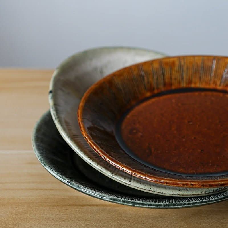 Nishida Muyu oval deep plates in earth tones, Japan-made ceramic tableware for sushi & more.