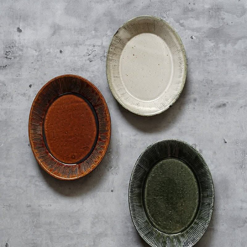 Nishida Muyu Japan-made katsume oval deep plates in earth tones, imported ceramic tableware.