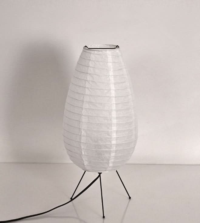 White paper table lamp long oval lamp on minimalist black legs, mid-century style