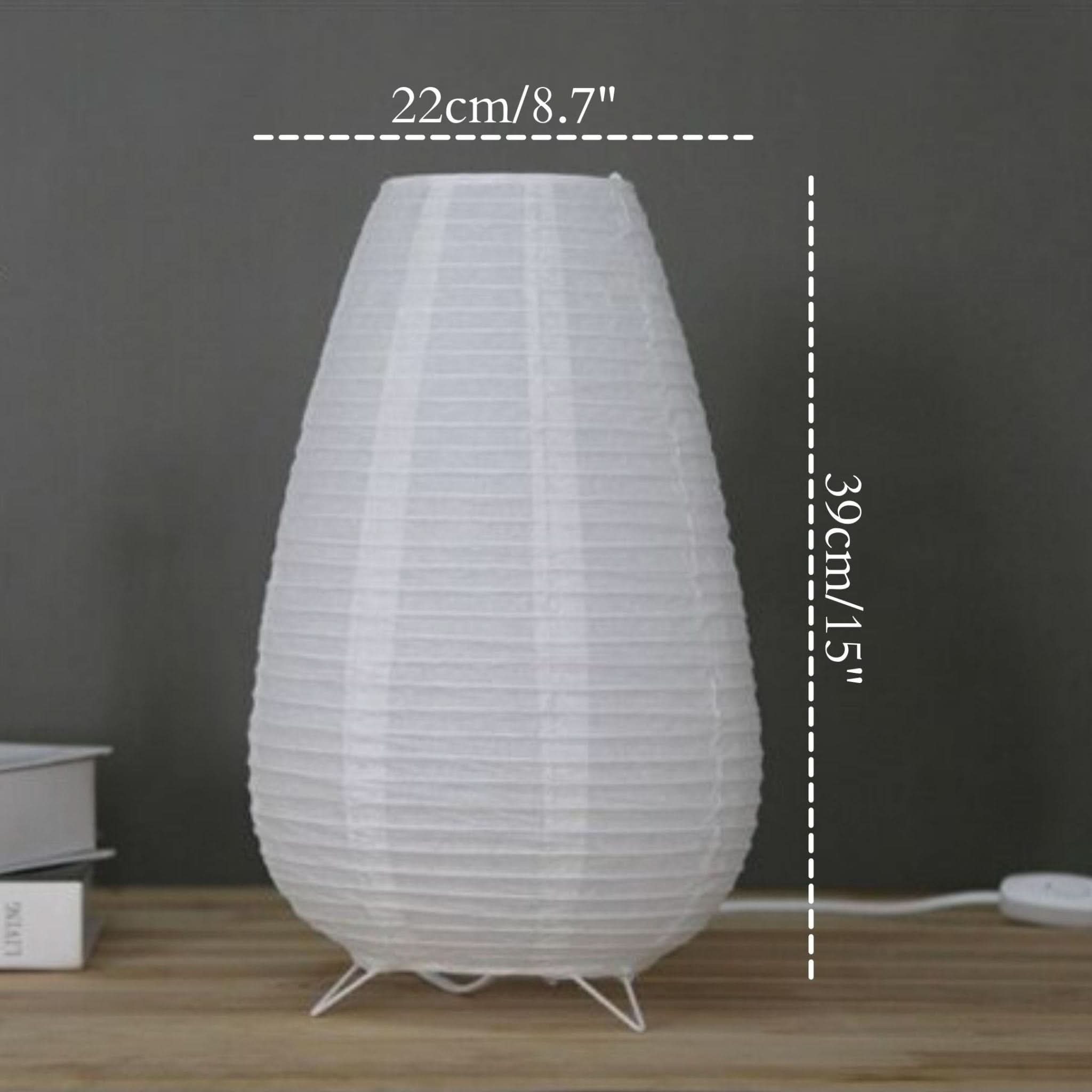 White paper table lamp, elongated design, on wooden surface, 39cm/15" height