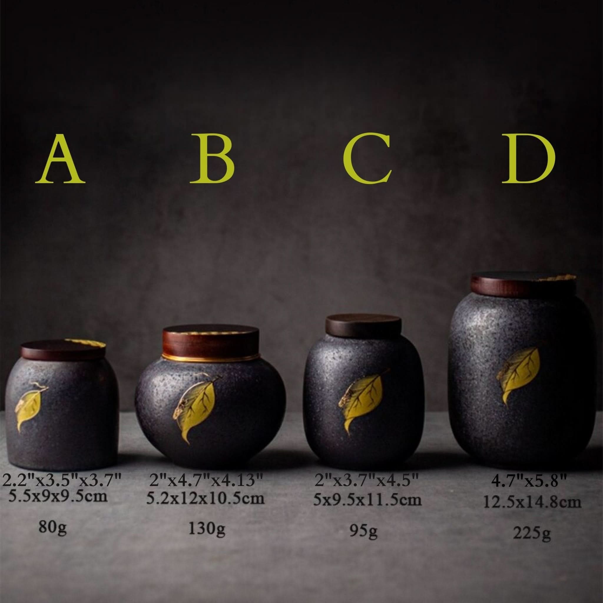 Black pottery jar with lid, leaf design. Storage container for tea, coffee, sugar, spices, herbs.