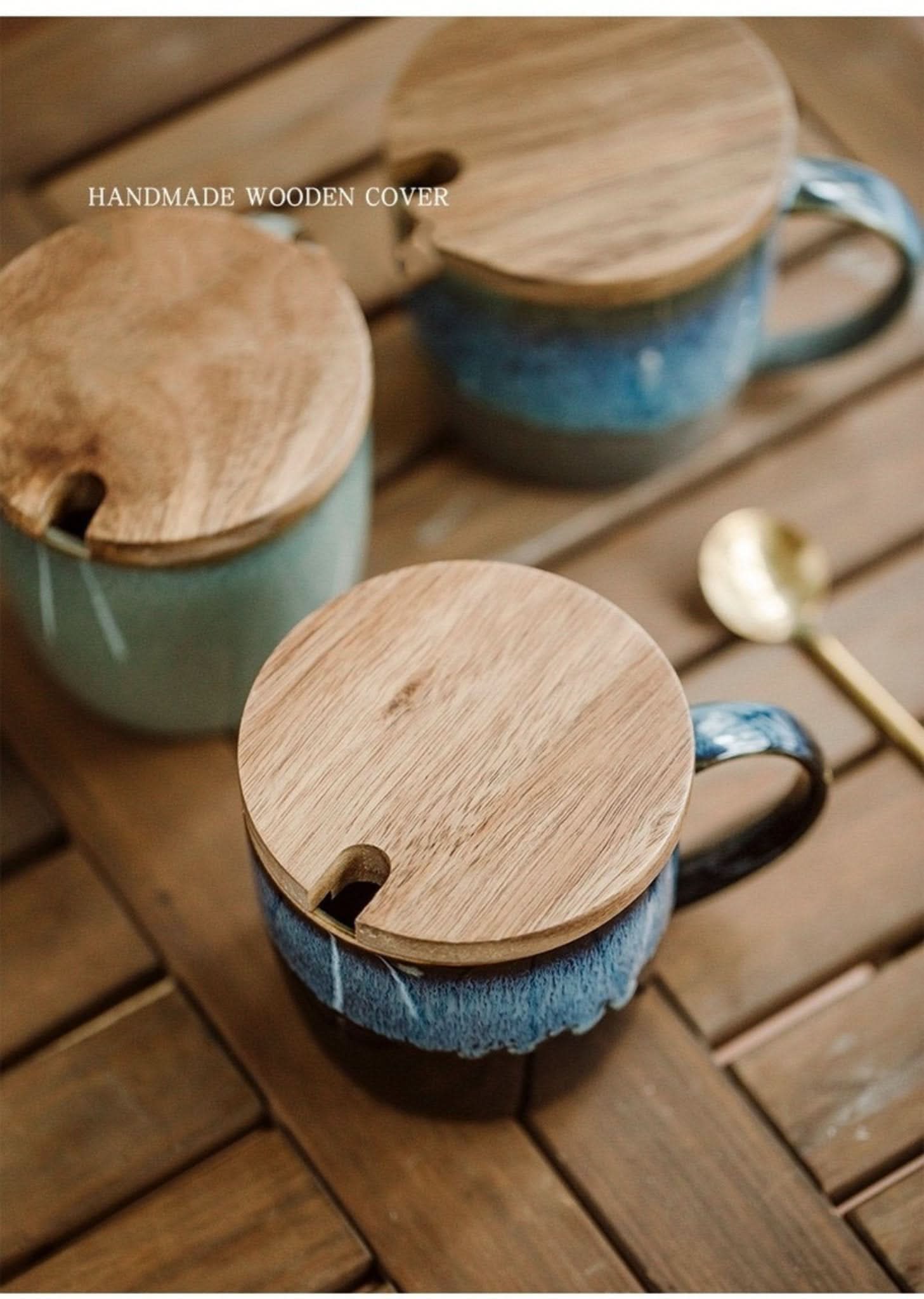 Reactive Glazed Mug 13.5oz with wooden lid and spoon on wooden surface, colorful ceramics.