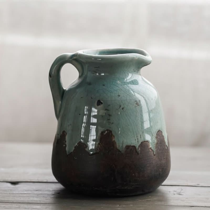 Retro distressed gray-blue binaural ceramic vase with crackled finish, ideal for living room or dining table decor.