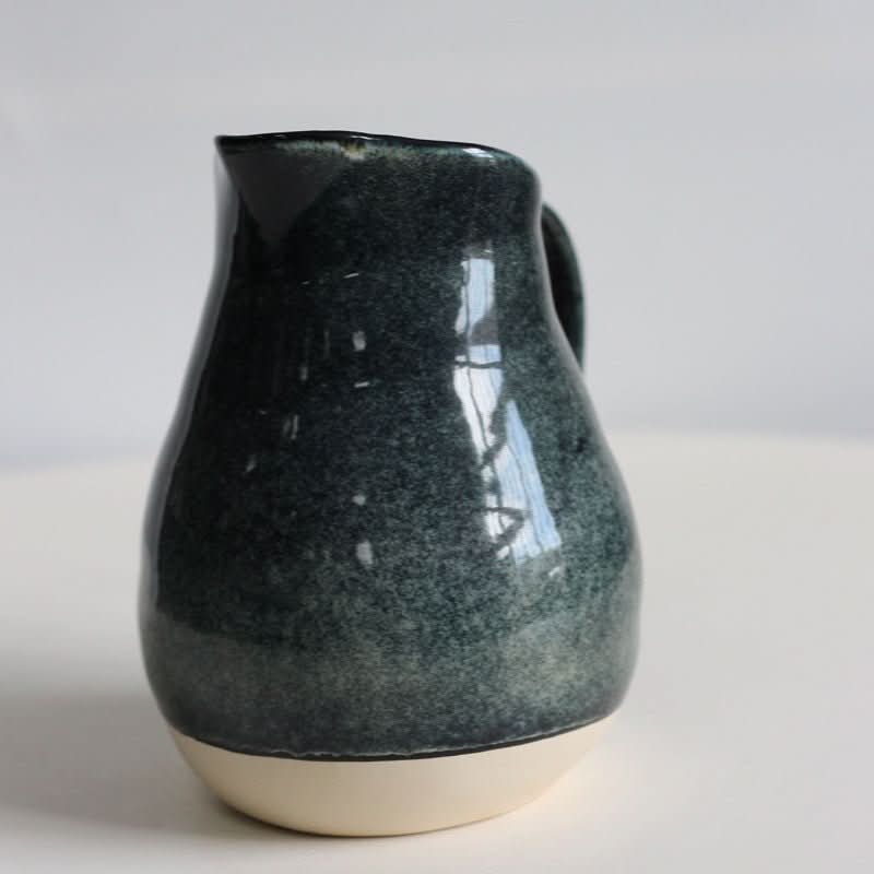 Retro Kiln-Changing Glaze Ceramic Milk Tank, dark speckled glaze pitcher with cream base.
