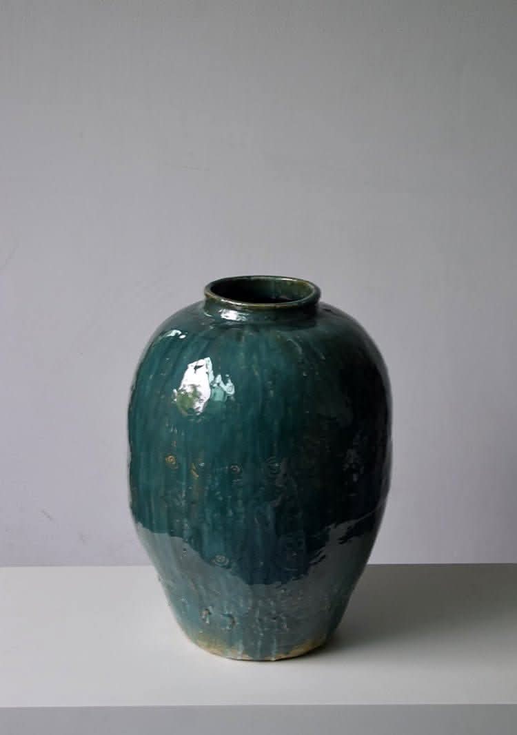 Rustic Distressed Rounded Vase with dark green blue glaze and circular engraved pattern