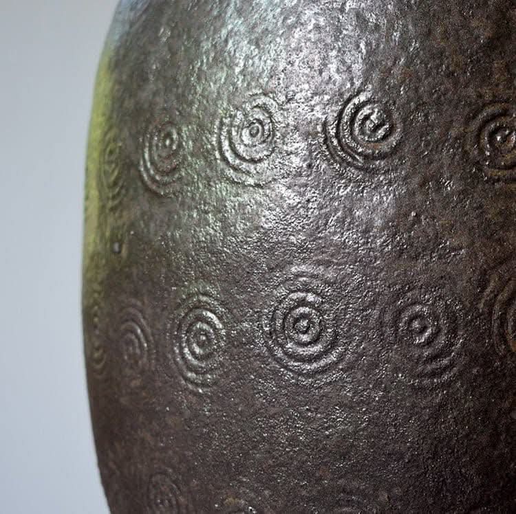 Rustic Distressed Rounded Vase with dark green-blue glaze and engraved circular pattern