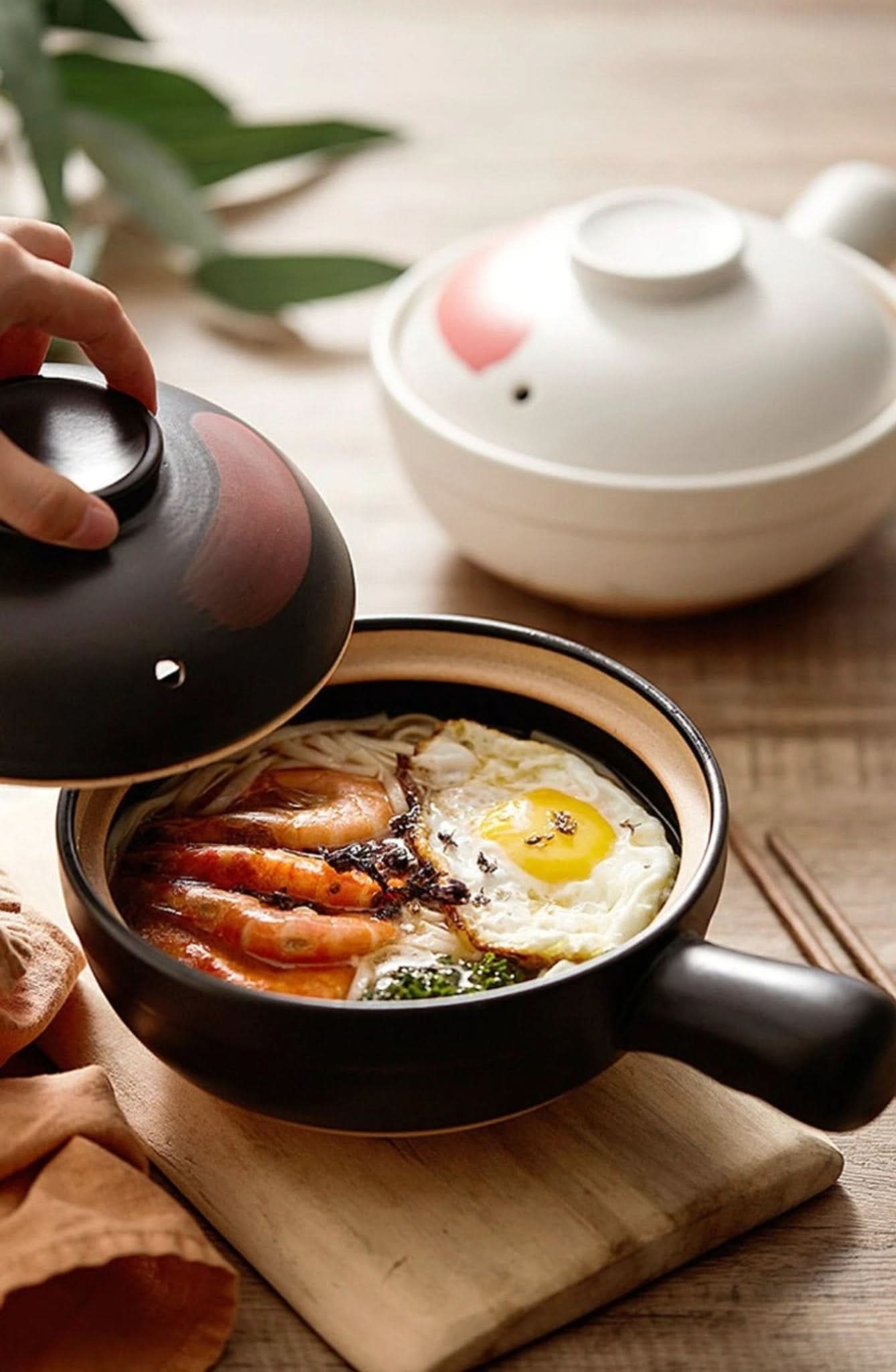 Rustic Unglazed Stoneware Baking Plate holding ramen, shrimp & egg. Japanese ceramic tableware.
