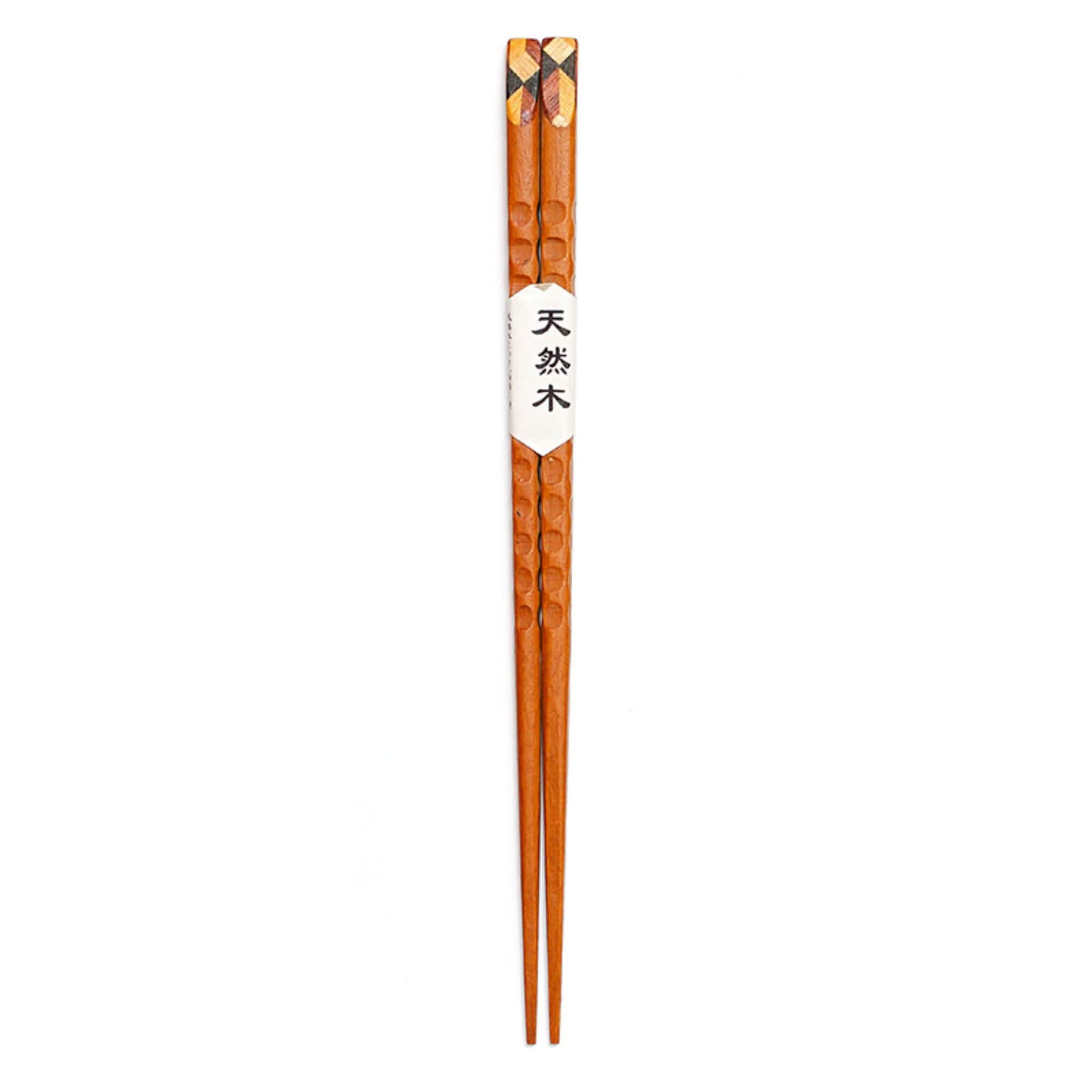 Set of 10 pairs wooden chopsticks with colored upper part and engraved label.