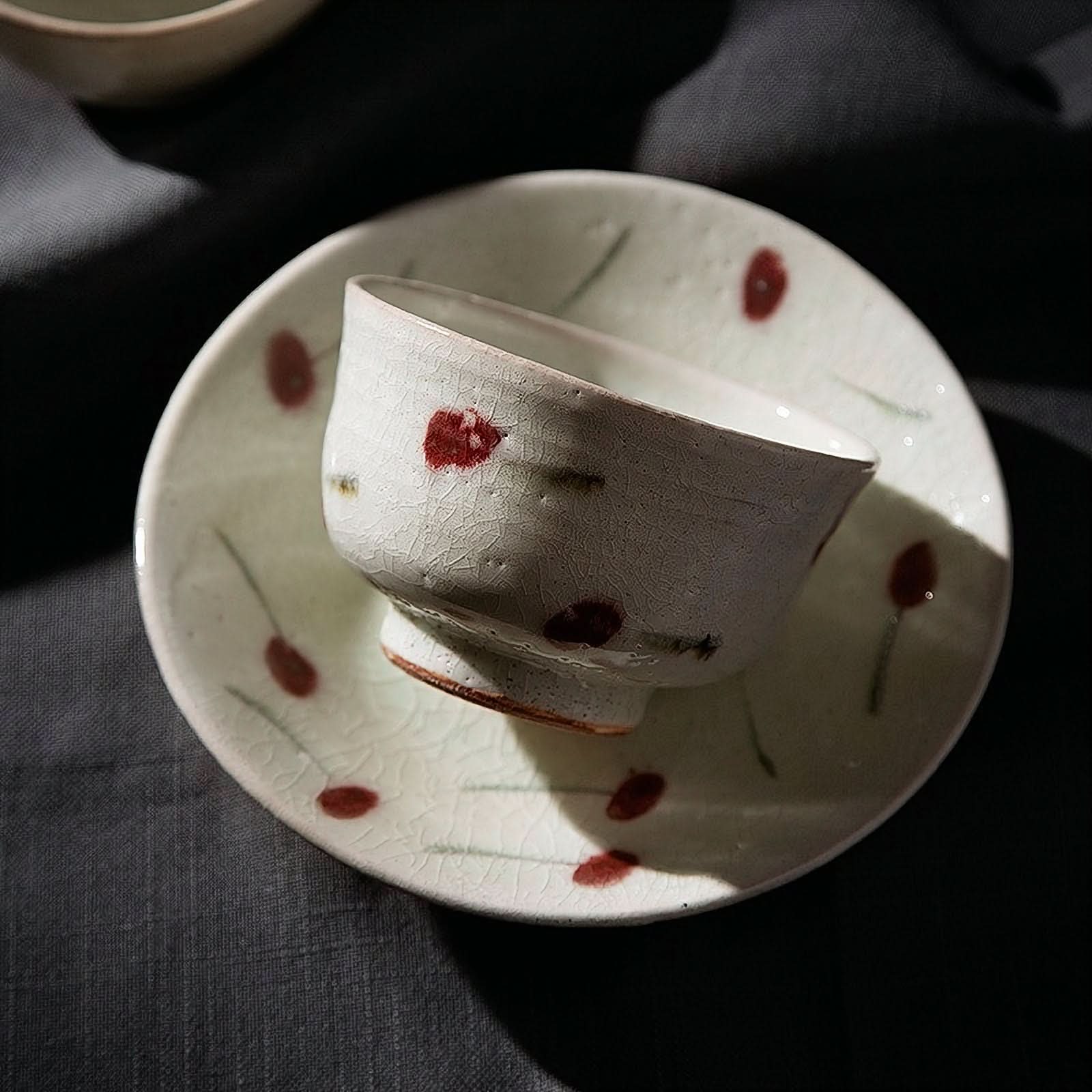 Rustic ice cracked cherry glaze tableware set with red cherry design on white ceramic, imported from Japan.