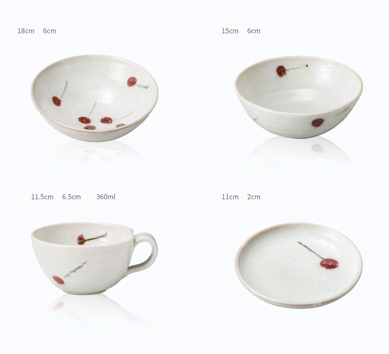 Japanese handmade tableware: Ice Cracked Cherry Glaze set. Rustic ceramic bowls, cup, and plate with cherry design.