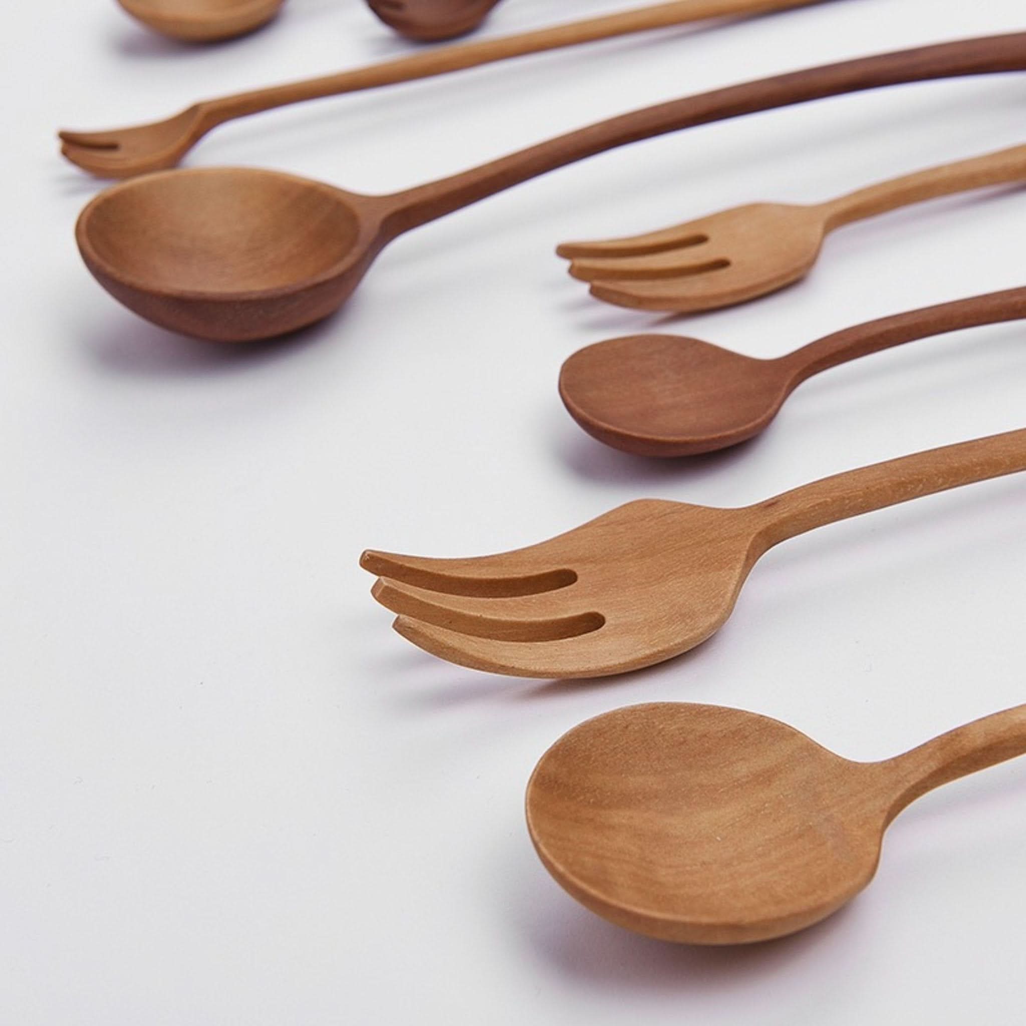 Set of Japan 12 Wooden Kitchen Utensils: Natural wood spoons & forks on white background.