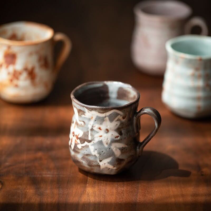 Shino-Yaki ceramic mug with floral pattern, rustic handmade Japanese pottery, tea cup
