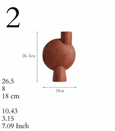 Brown ceramic vase, abstract sculptural design, 26.5cm height, 18cm width.