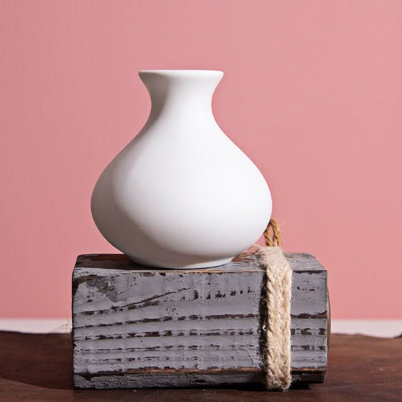 Small Ceramic White Bud Vases on distressed wood block with rope accent
