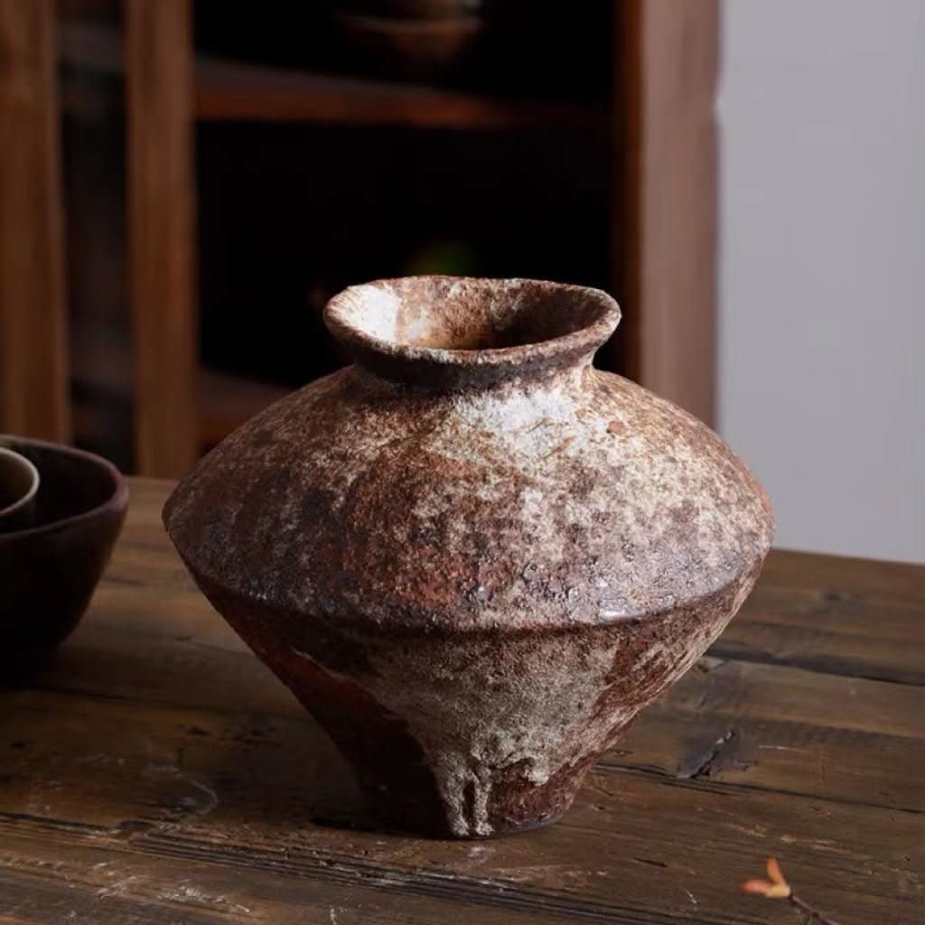 Wabi Sabi ceramic vase, rustic brown speckled, on wooden table