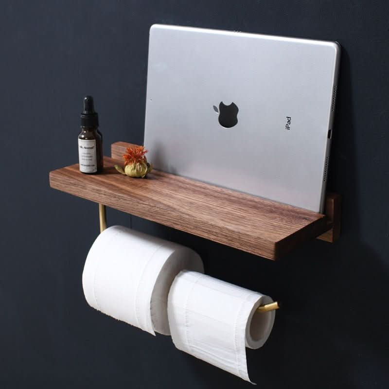 Solid wood & gold toilet paper holder with shelf, holding two rolls & iPad.