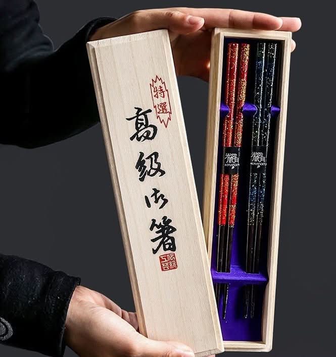 Handmade lacquered Japanese chopsticks in red & blue glitter, presented in a wooden box.