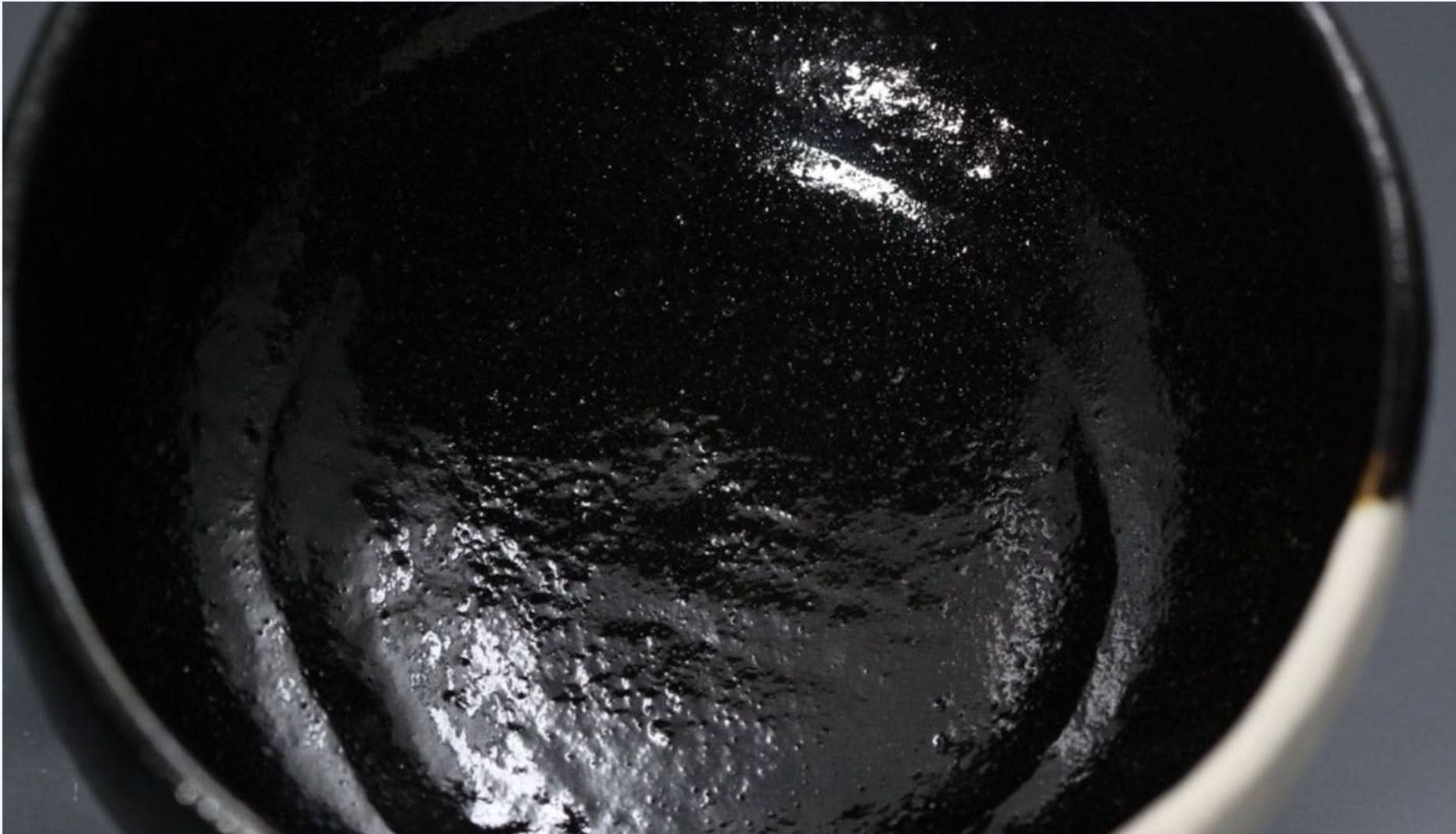 Black and white stoneware matcha bowl with flowers, 7oz, hand-painted in Japan