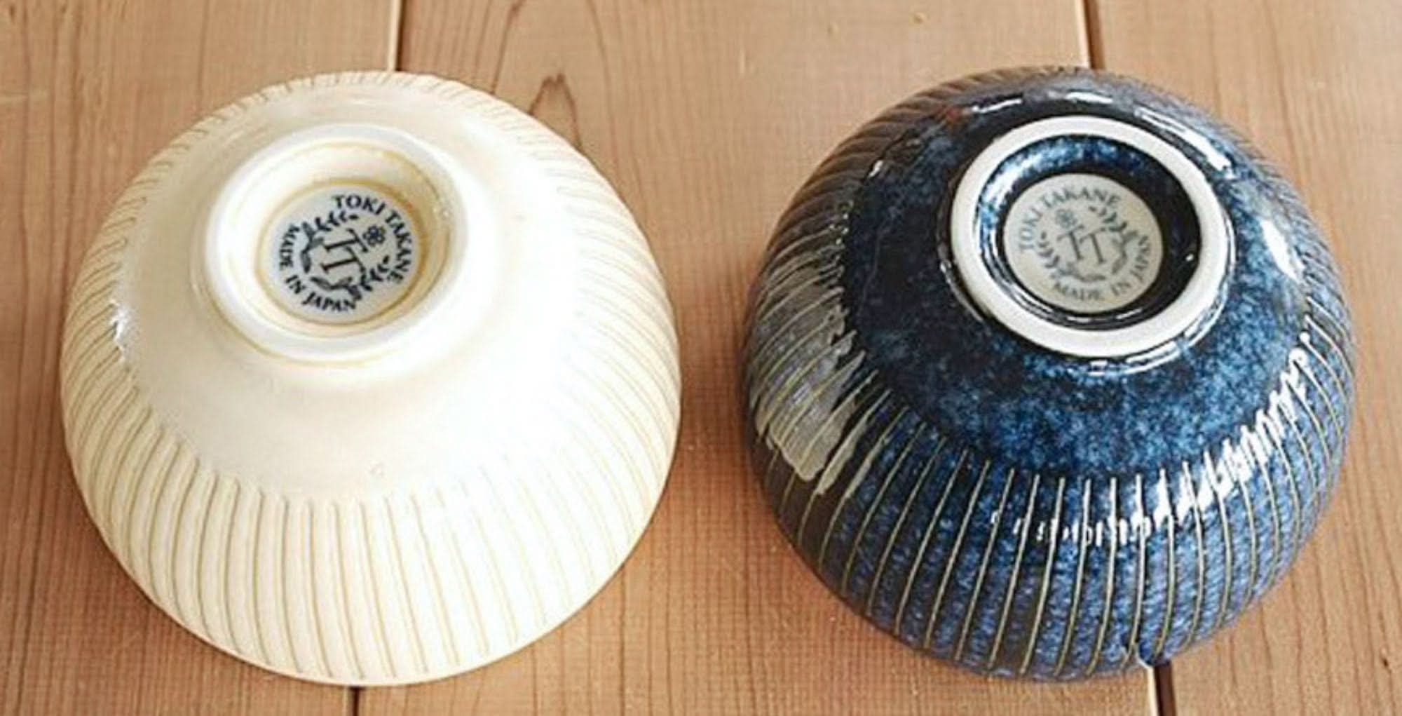 Two stoneware soup bowls: one cream, one blue speckled, Japan imported.