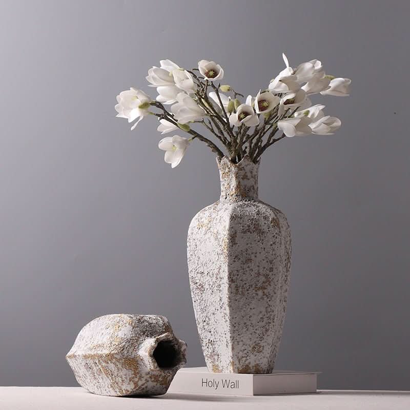 Textured Stone Vase with Hexagonal Shape, rustic white & gold stoneware with white flowers.